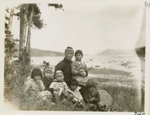 Image: MacMillan and Eskimo [Inuit] children [Miriam Brown sitting on DBM's lap, Maggie Brait w